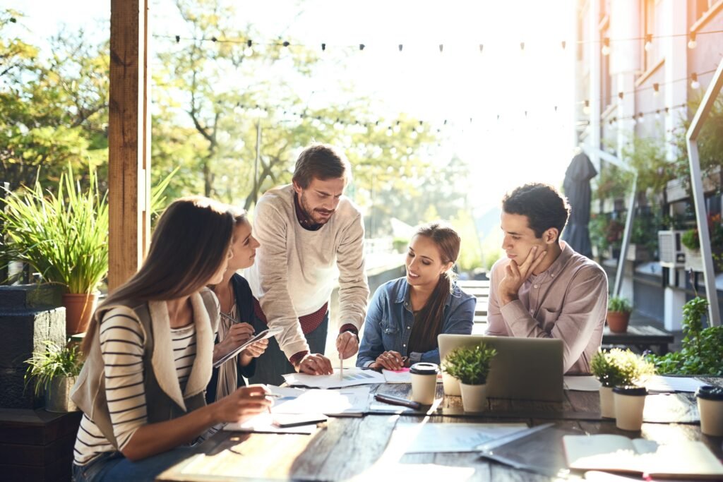 small,business,,people,and,paper,at,cafe,for,meeting,,company